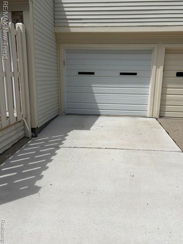1412 Hidden Meadows Drive B, Walled Lake, MI 48390