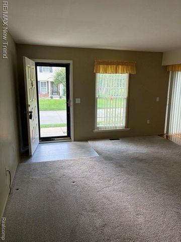 1412 Hidden Meadows Drive B, Walled Lake, MI 48390