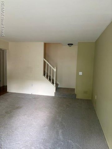 1412 Hidden Meadows Drive B, Walled Lake, MI 48390