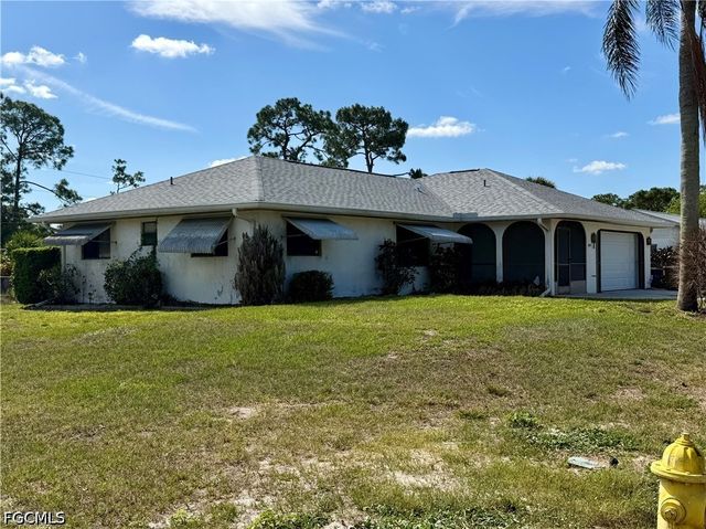 122 Roosevelt AVE, Lehigh Acres, FL 33936
