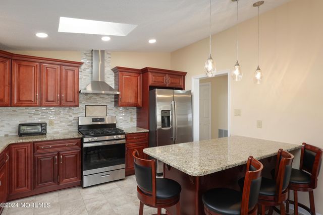 16 Pine Tree Lane, Manalapan, NJ 07726