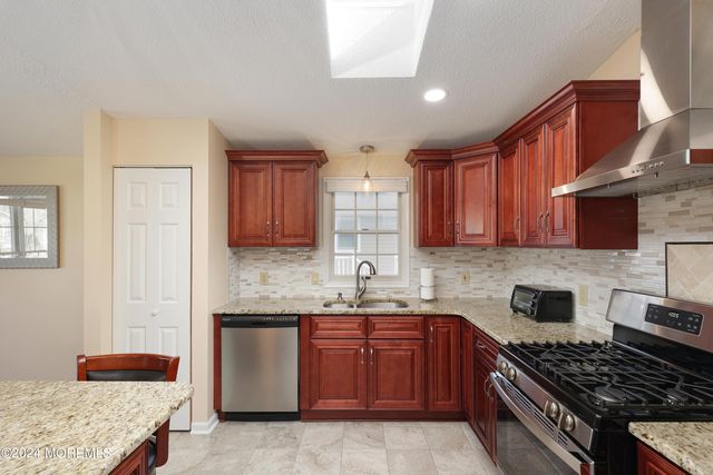 16 Pine Tree Lane, Manalapan, NJ 07726