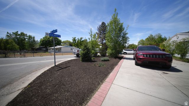 1863 E VILLAGE GREEN RD, Cottonwood Heights, UT 84121