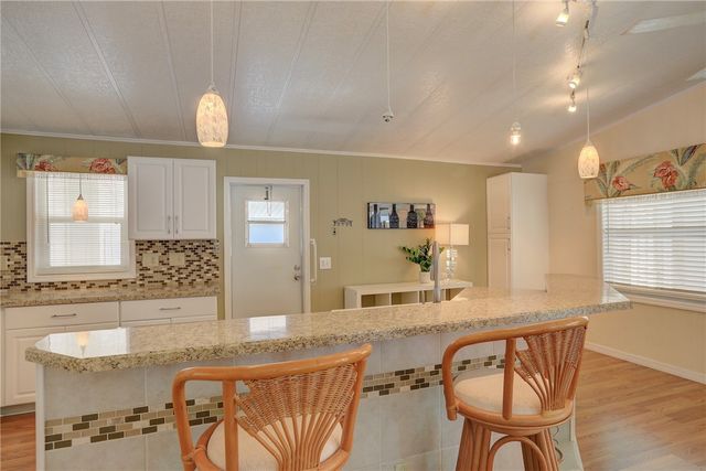 1056 Royal Palm Drive, Barefoot Bay, FL 32976