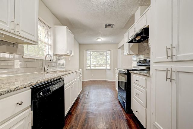 22318 Meadowgate Drive, Spring, TX 77373