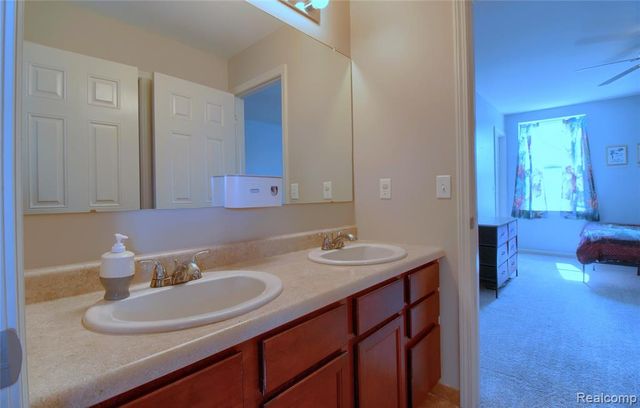57649 Blossom Valley Trail, New Hudson, MI 48165