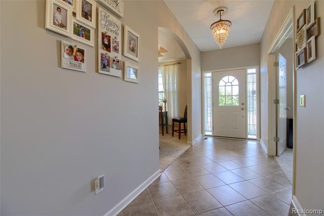 57649 Blossom Valley Trail, New Hudson, MI 48165