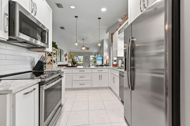 6103 Bear Creek Court, Greenacres, FL 33467