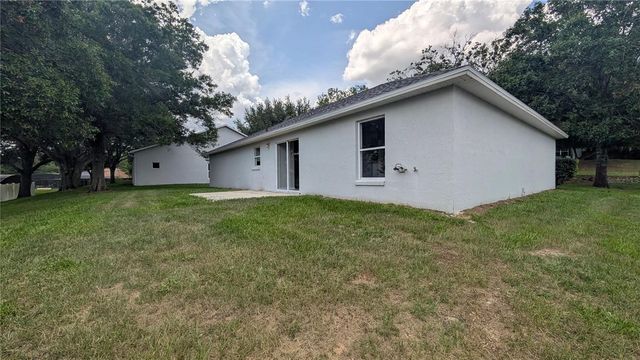 1306 WINDY BLUFF DRIVE, Minneola, FL 34715