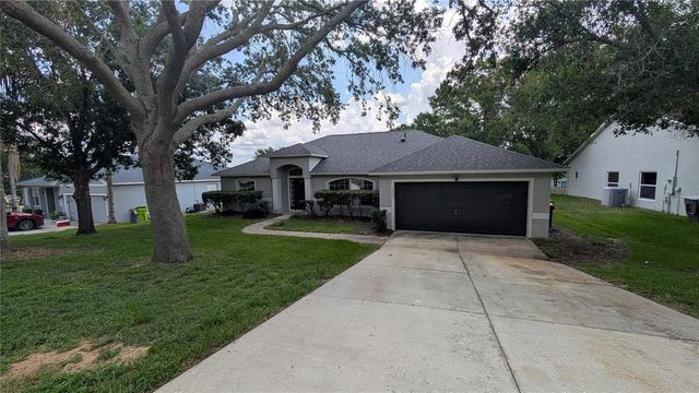 1306 WINDY BLUFF DRIVE, Minneola, FL 34715