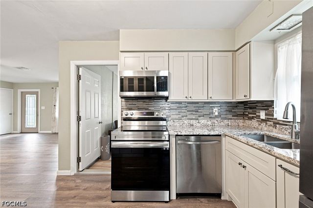 108 Contee DR, Lehigh Acres, FL 33936
