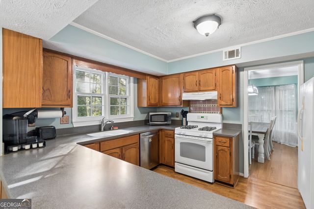 1880 Whispering Willow Way SW, Lilburn, GA 30047