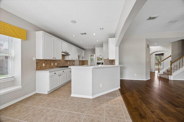12847 Magic Falls Drive, Tomball, TX 77377