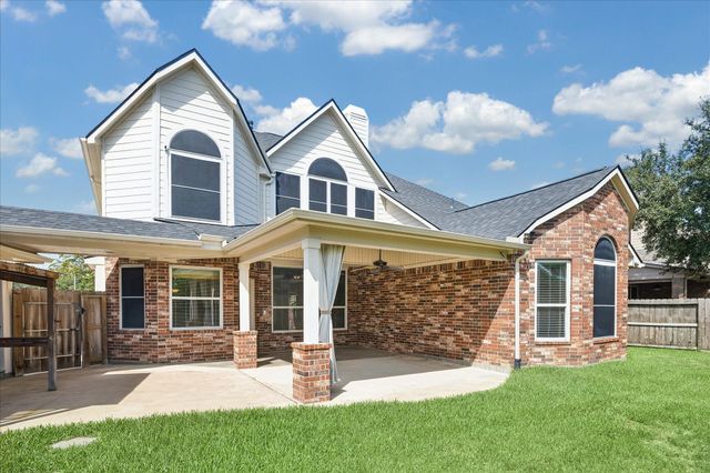 12847 Magic Falls Drive, Tomball, TX 77377