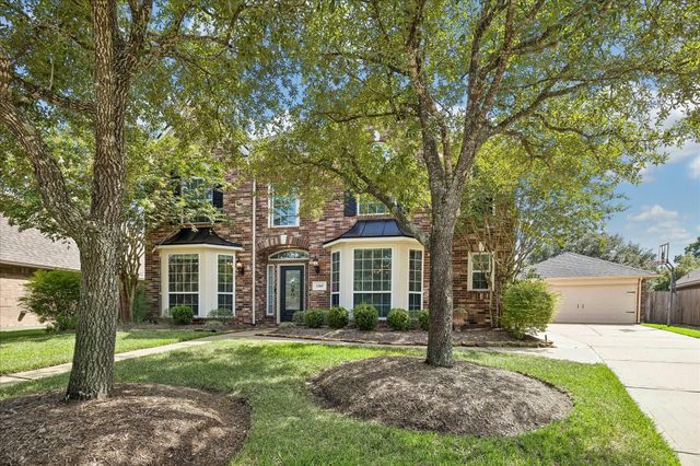12847 Magic Falls Drive, Tomball, TX 77377