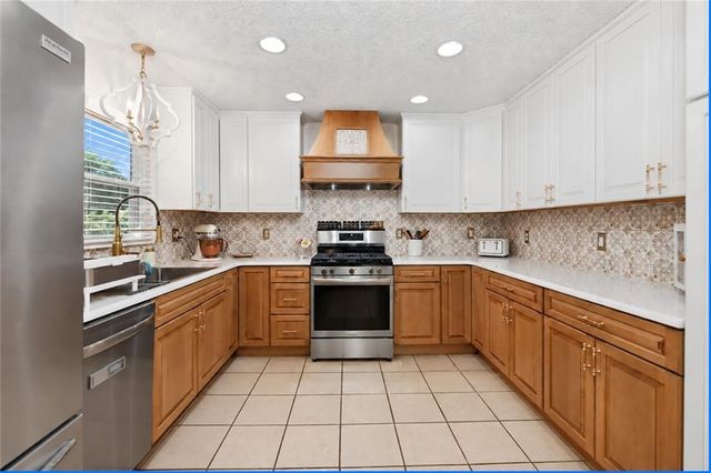 12408 Monroe Avenue, Grandview, MO 64030