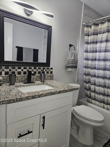 901 Falconer Street NW, Palm Bay, FL 32907