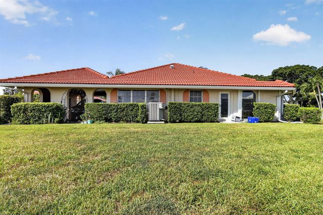 213 Rio Vista Circle, Atlantis, FL 33462