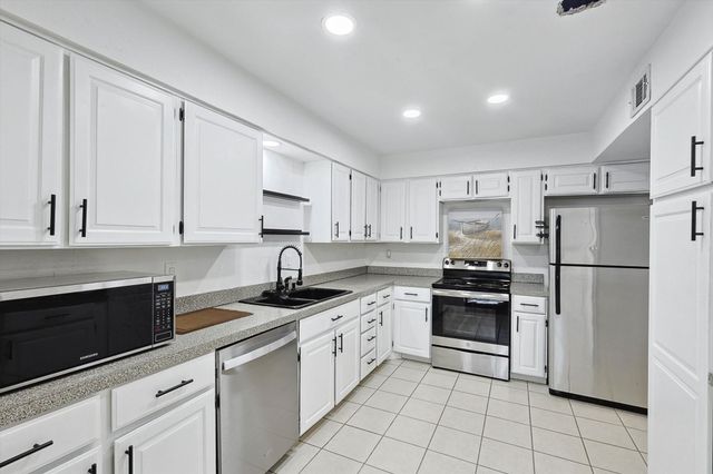 9801 Smokefeather Lane, Dallas, TX 75243