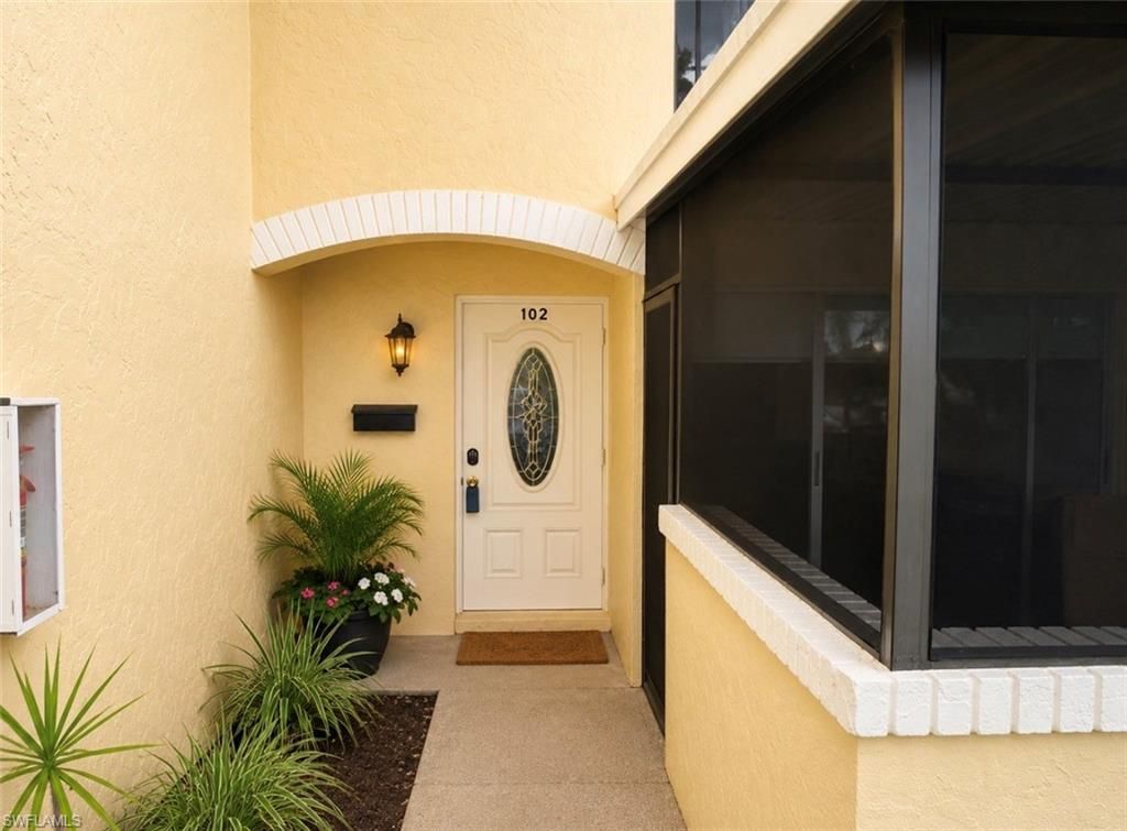 102 E Greens BLVD, LEHIGH ACRES, FL 33936 — exterior