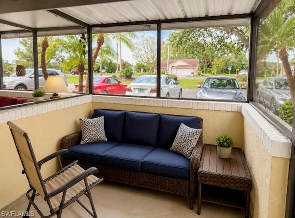 102 E Greens BLVD, LEHIGH ACRES, FL 33936 — photo 4