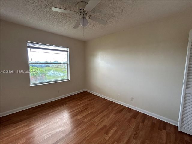 910 E Cypress Way E, Palm Springs, FL 33406