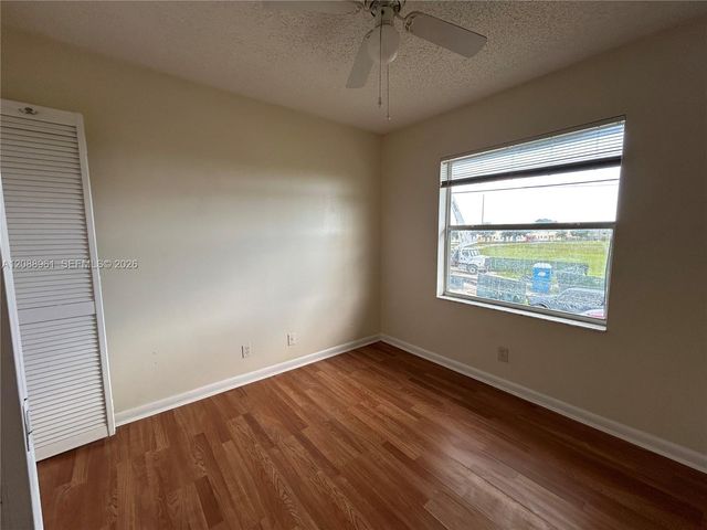 910 E Cypress Way E, Palm Springs, FL 33406