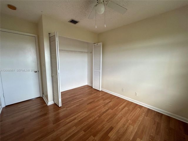 910 E Cypress Way E, Palm Springs, FL 33406