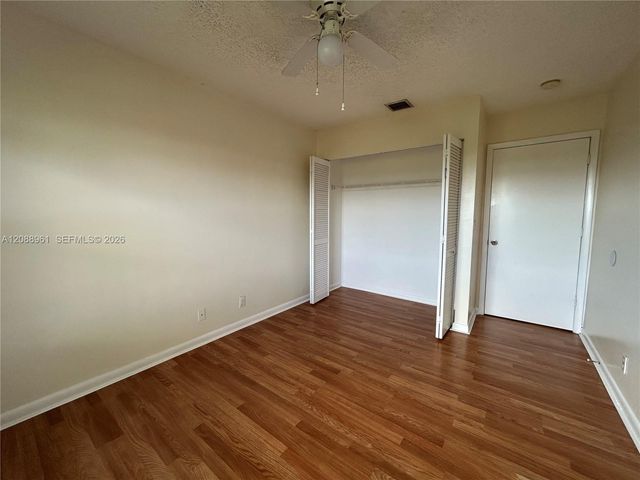 910 E Cypress Way E, Palm Springs, FL 33406
