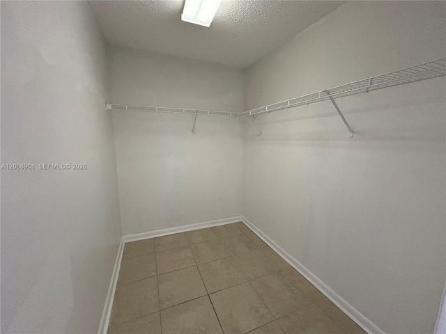 910 E Cypress Way E, Palm Springs, FL 33406