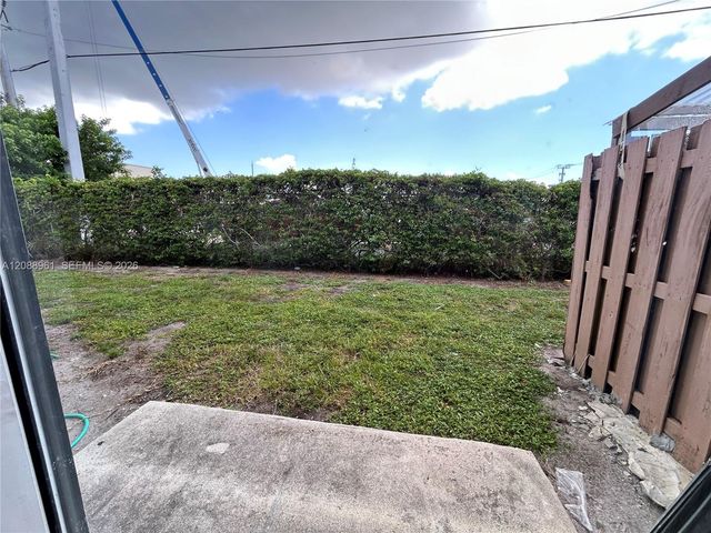 910 E Cypress Way E, Palm Springs, FL 33406