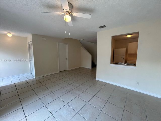 910 E Cypress Way E, Palm Springs, FL 33406