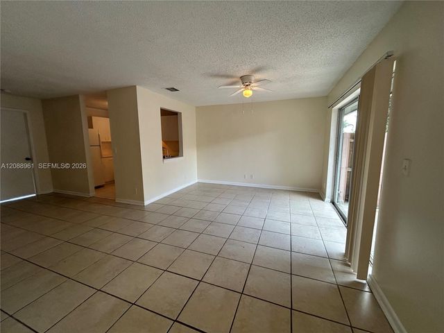 910 E Cypress Way E, Palm Springs, FL 33406