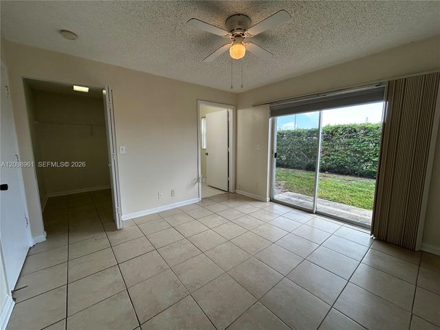 910 E Cypress Way E, Palm Springs, FL 33406