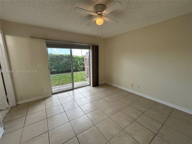 910 E Cypress Way E, Palm Springs, FL 33406
