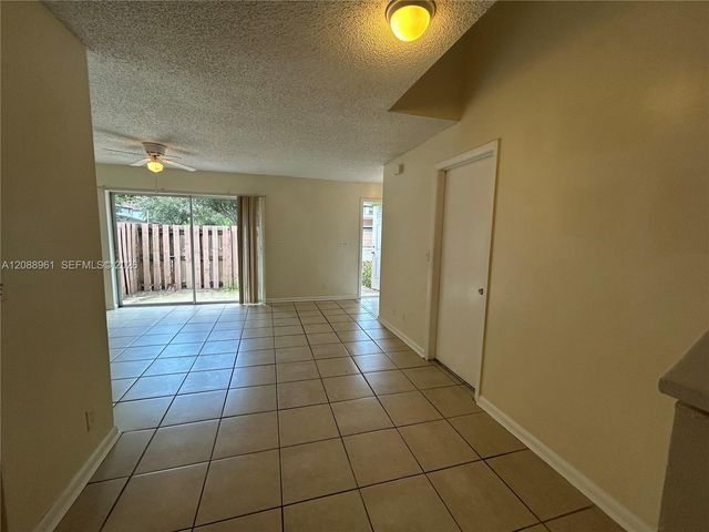 910 E Cypress Way E, Palm Springs, FL 33406