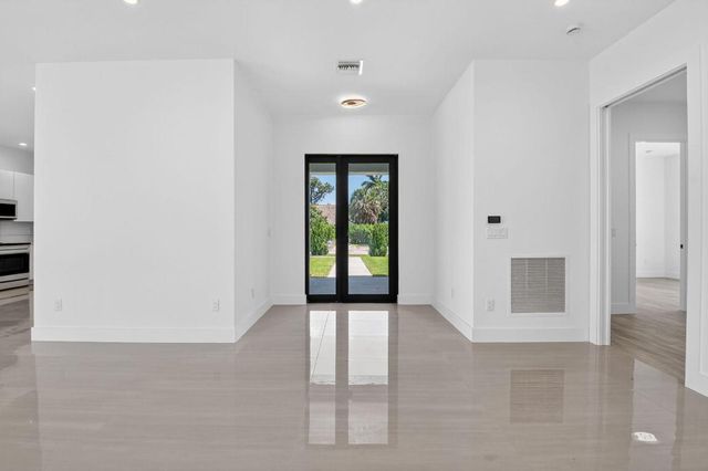 3920 Espan Court, Palm Springs, FL 33461