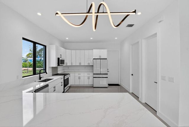 3920 Espan Court, Palm Springs, FL 33461