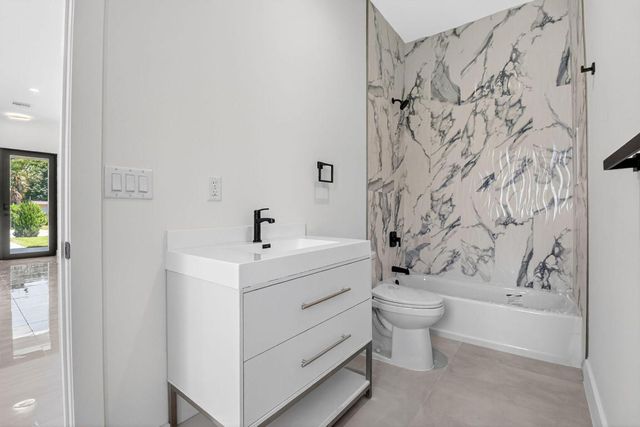 3920 Espan Court, Palm Springs, FL 33461