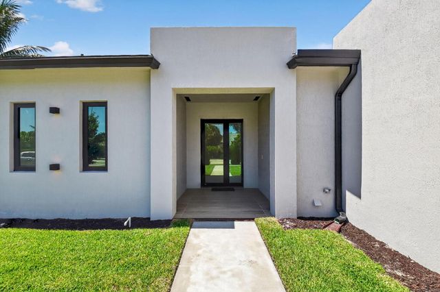 3920 Espan Court, Palm Springs, FL 33461