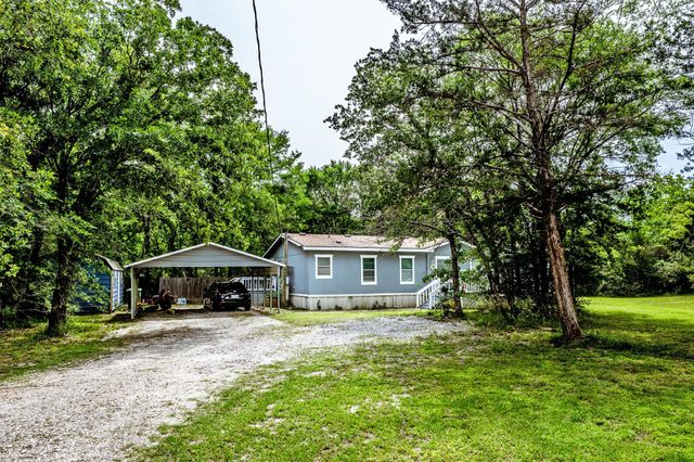 66 Horseshoe Lake Road, Huntsville, TX 77320