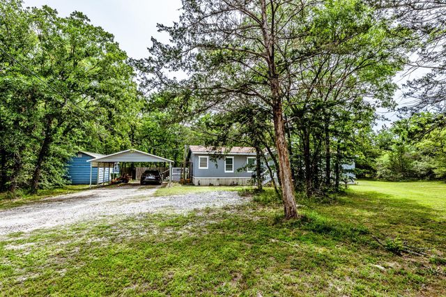 66 Horseshoe Lake Road, Huntsville, TX 77320