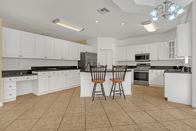 2465 Westmont Lane, Royal Palm Beach, FL 33411