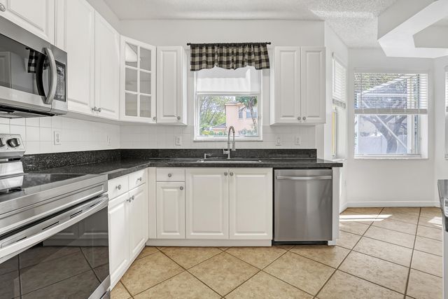 2465 Westmont Lane, Royal Palm Beach, FL 33411