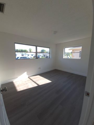 9040 NW 26th Place, Sunrise, FL 33322