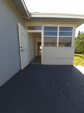 9040 NW 26th Place, Sunrise, FL 33322