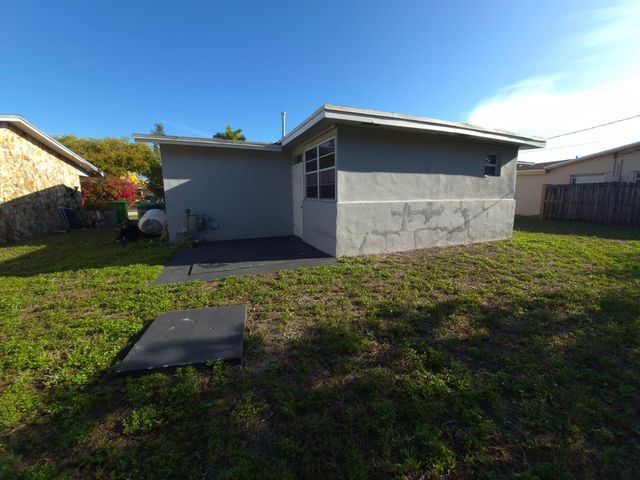 9040 NW 26th Place, Sunrise, FL 33322