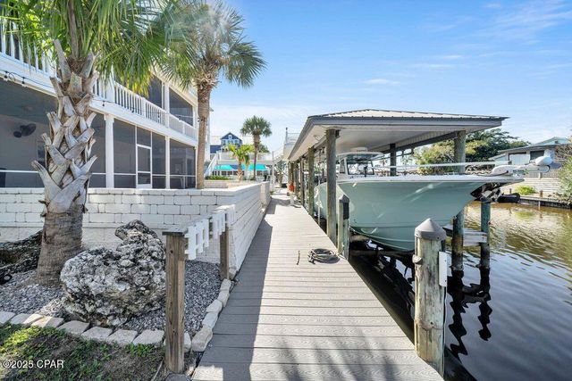 1001 Lighthouse Lagoon Court, Panama City Beach, FL 32407