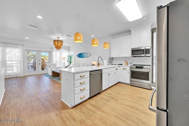 1001 Lighthouse Lagoon Court, Panama City Beach, FL 32407