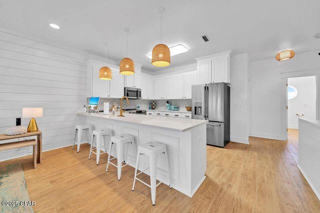 1001 Lighthouse Lagoon Court, Panama City Beach, FL 32407